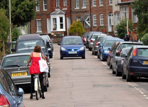 waiting-narrow-road-parked-cars