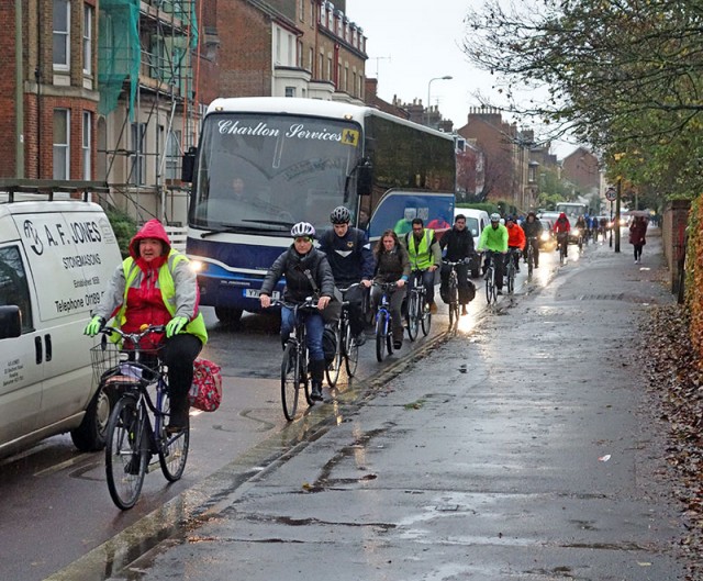 line-of-wet-cyclists